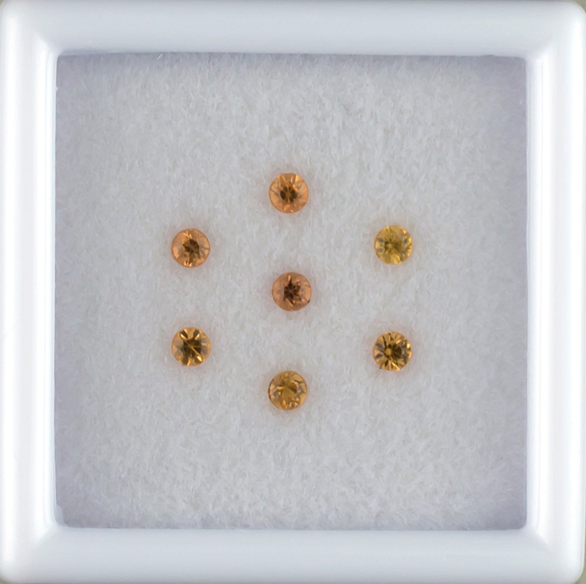 0.27twt Orange Sapphire Melee Parcel Top View White Background