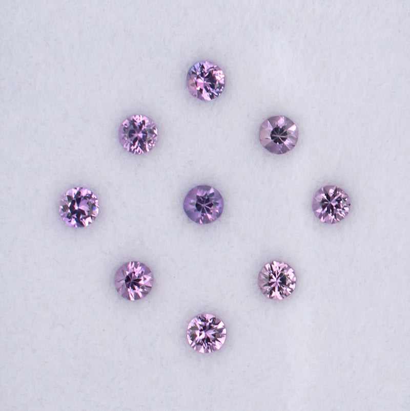 0.86twt Purple Sapphire Colored Gemstone Melee Parcel Top View White Background