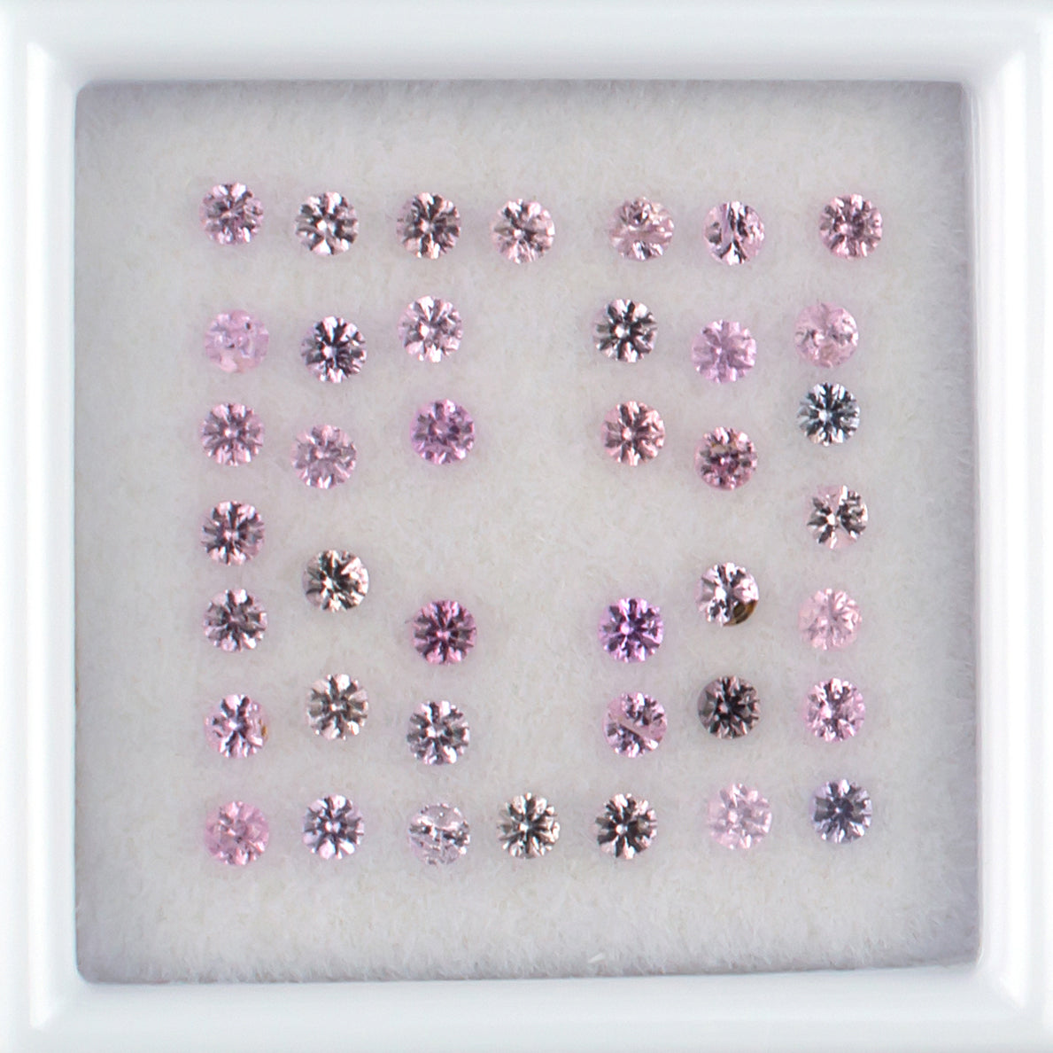 0.90twt Pink Sapphire Colored Gemstone Melee Parcel Top View White Background