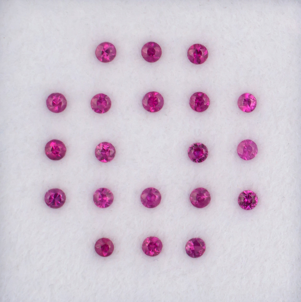 0.94twt Mogok Ruby Colored Gemstone Melee Parcel Top View White Background