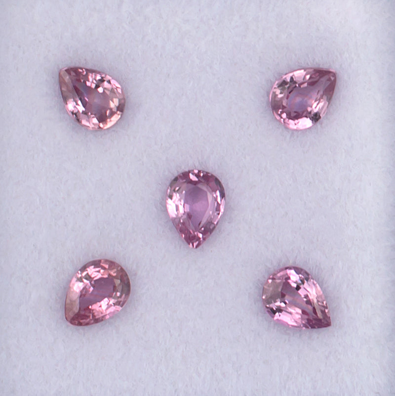 0.96twt Pink Sapphire Colored Gemstone Melee Parcel Top View White Background