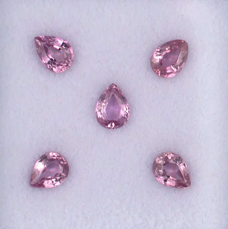 0.96twt Pink Sapphire Colored Gemstone Melee Parcel Top View White Background