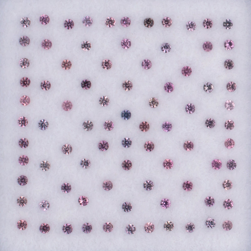 0.99twt Pink Sapphire Colored Gemstone Melee Parcel Top View White Background