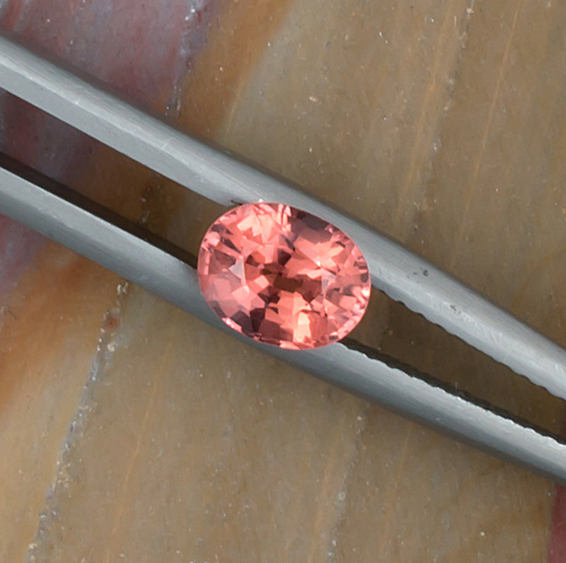 1.00ct Pink Orange Padparadscha Spinel Top View Natural Background
