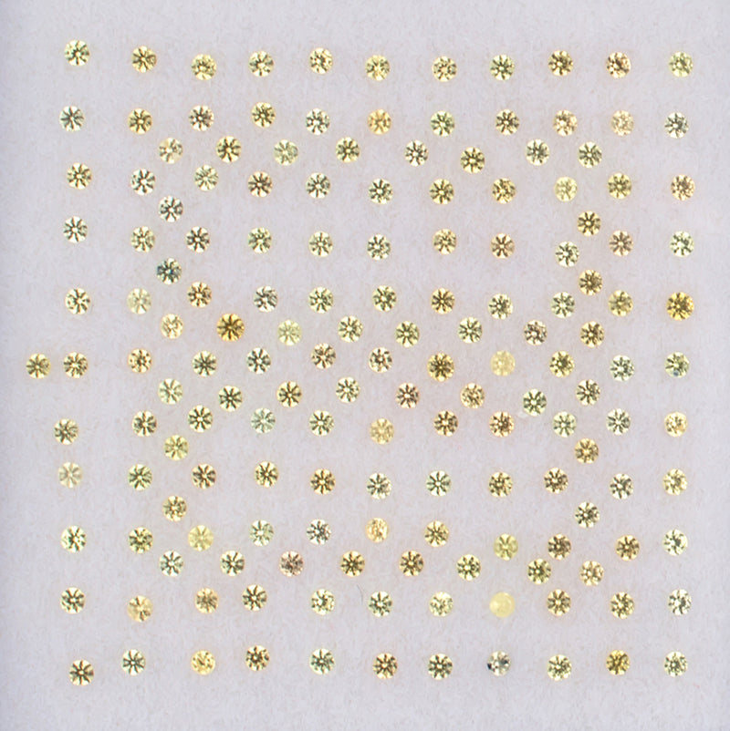 1.00mm Yellow Sapphire Colored Gemstone Melee Parcel Top View White Background