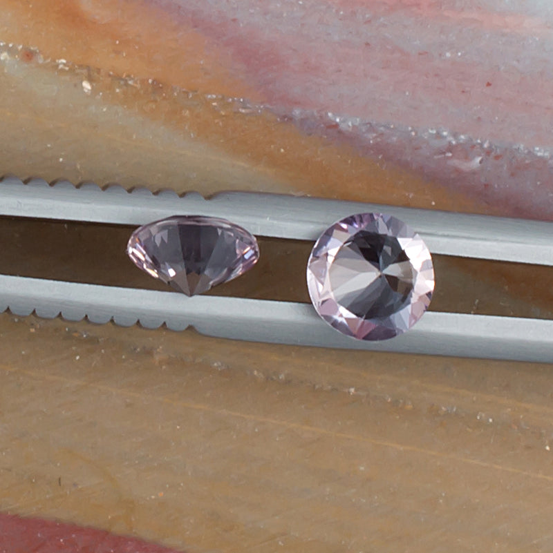 1.01twt Pink Sapphire Colored Gemstone Pair Bottom and Side View Natural Background