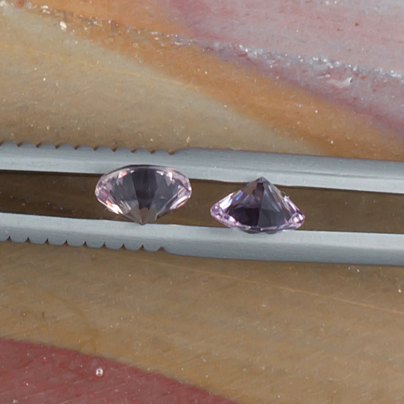 1.01twt Pink Sapphire Colored Gemstone Pair Side View Natural Background