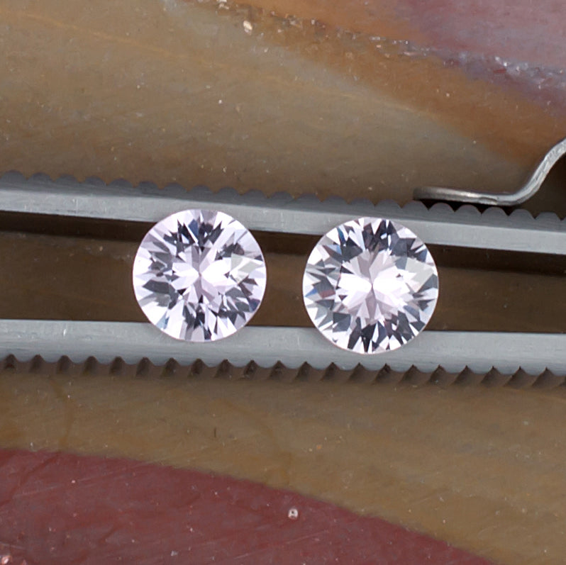 1.01twt Pink Sapphire Colored Gemstone Pair Top View Natural Background