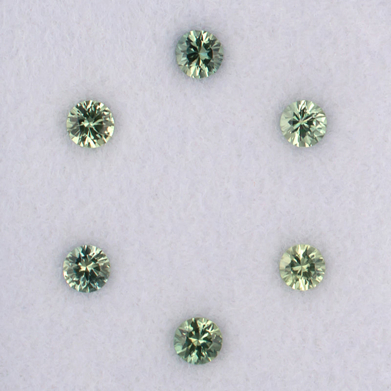 1.08twt Green Sapphire Colored Gemstone Melee Parcel Top View White Background