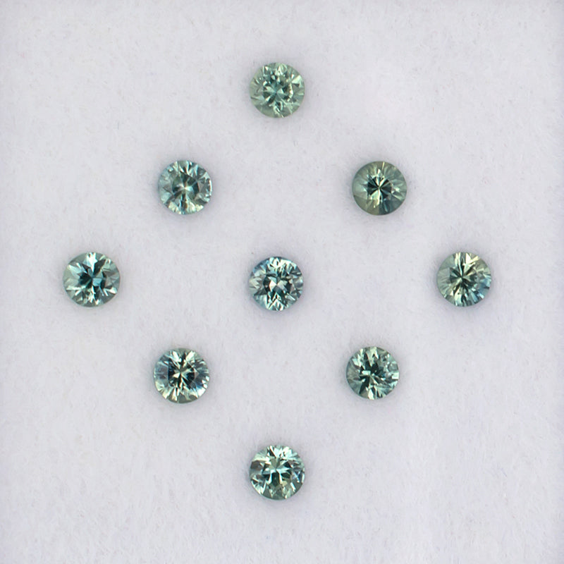 1.09twt Green Sapphire Colored Gemstone Melee Parcel Top View White Background