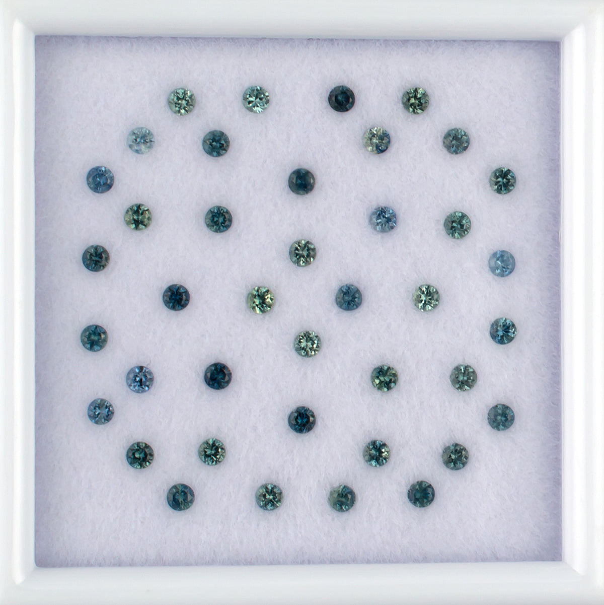 1.14twt Blue Sapphire Colored Gemstone Melee Parcel Top View White Background