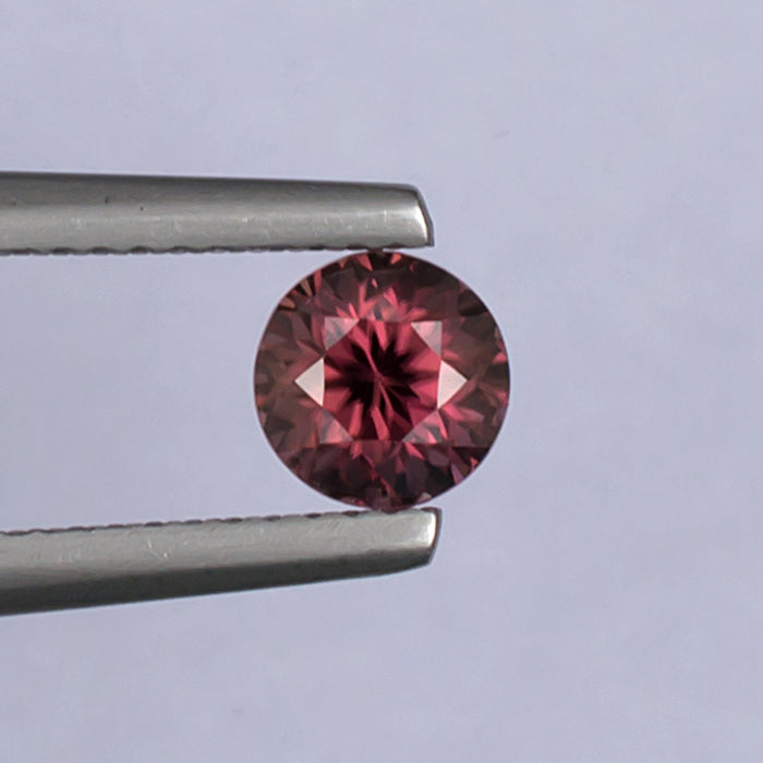 1.21ct Pink Zircon Colored Gemstone Top View White Background