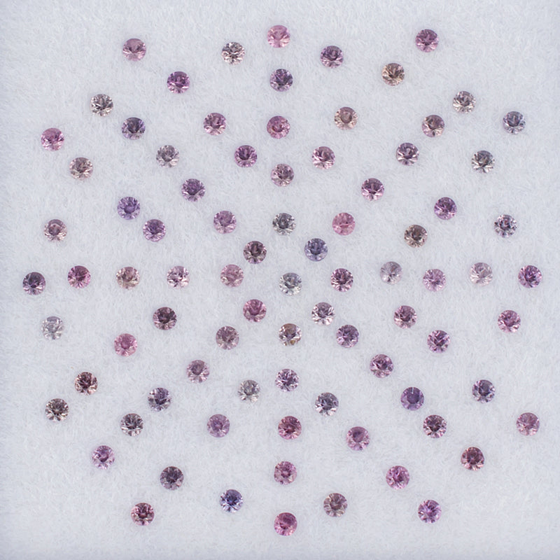 1.30mm Pink Sapphire Colored Gemstone Melee Parcel Top View White Background