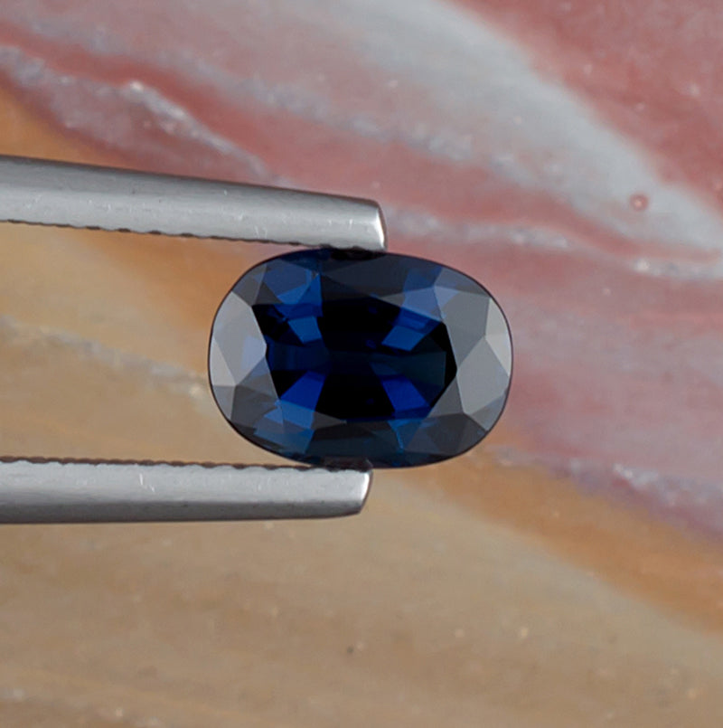 1.61ct Blue Sapphire Colored Gemstone Top View Natural Background