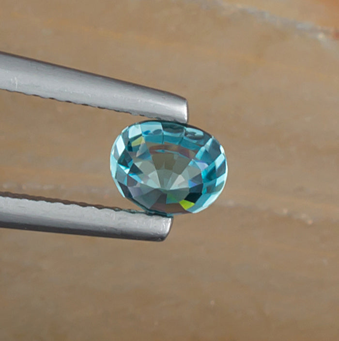 1.67ct Blue Zircon Colored Gemstone Bottom View Natural Background