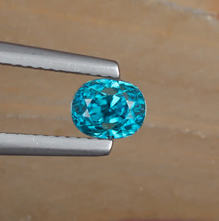 1.67ct Blue Zircon Colored Gemstone Top View Natural Background