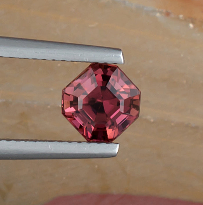 1.67ct Red Pink Tourmaline Colored Gemstone Top View Angle II Natural Background