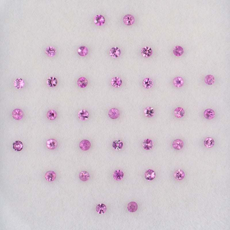 1.70mm Pink Sapphire Colored Gemstone Melee Parcel Top View White Background