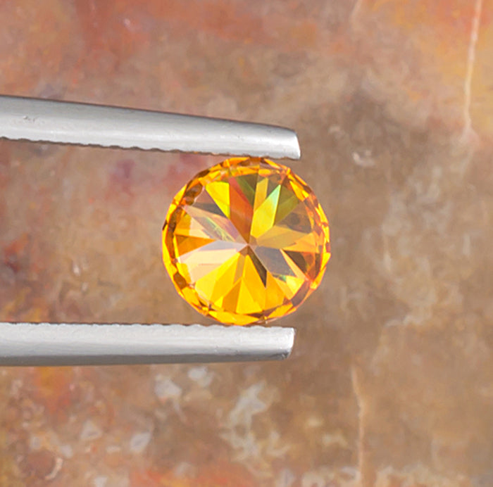 1.85ct Sphalerite Colored Gemstone Bottom View Natural Background