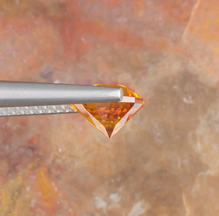 1.85ct Sphalerite Colored Gemstone Side View Natural Background