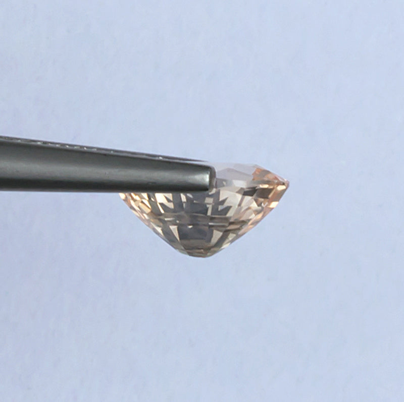 1.99ct Fancy Sapphire Colored Gemstone Side View Natural Background
