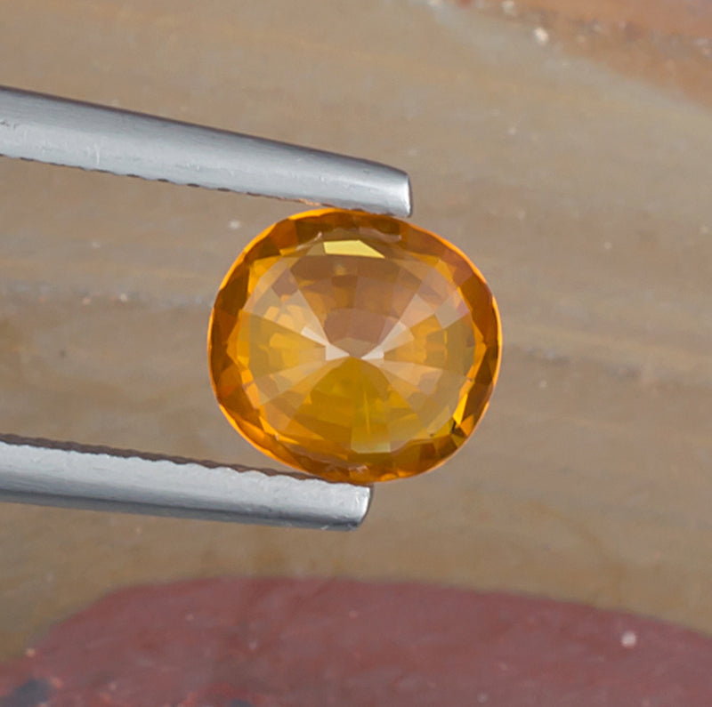 2.06ct Yellow Sapphire Colored Gemstone Bottom View Natural Background