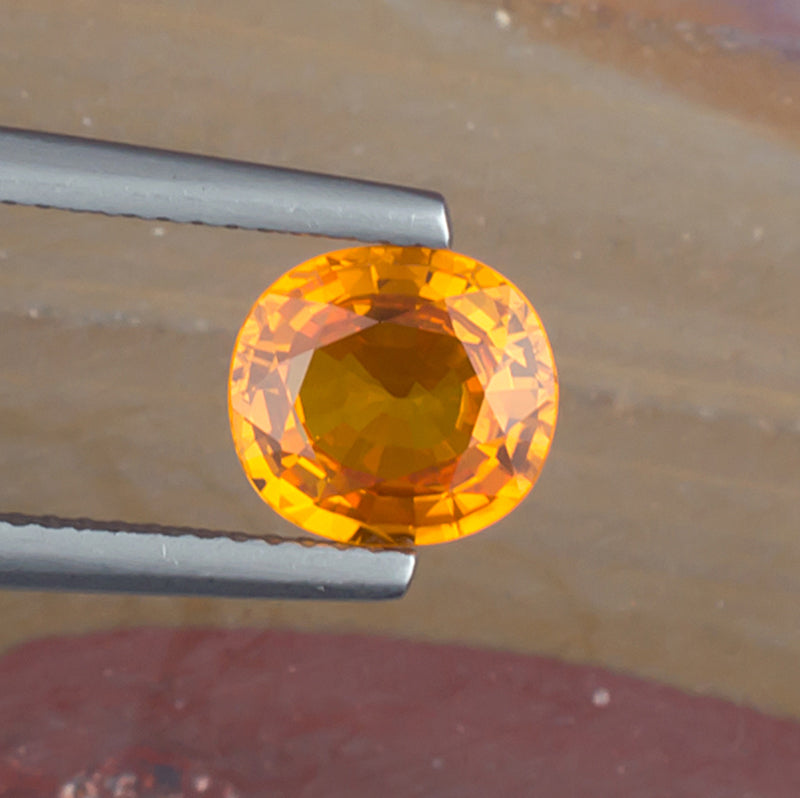 2.06ct Yellow Sapphire Colored Gemstone Top View Natural Background