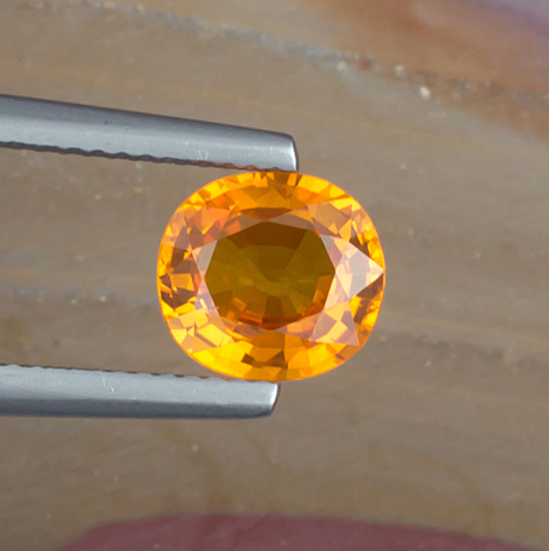 2.06ct Yellow Sapphire Colored Gemstone Top View Natural Background