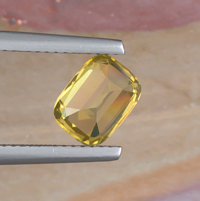 2.45ct Yellow Zircon Colored Gemstone Bottom View Natural Background
