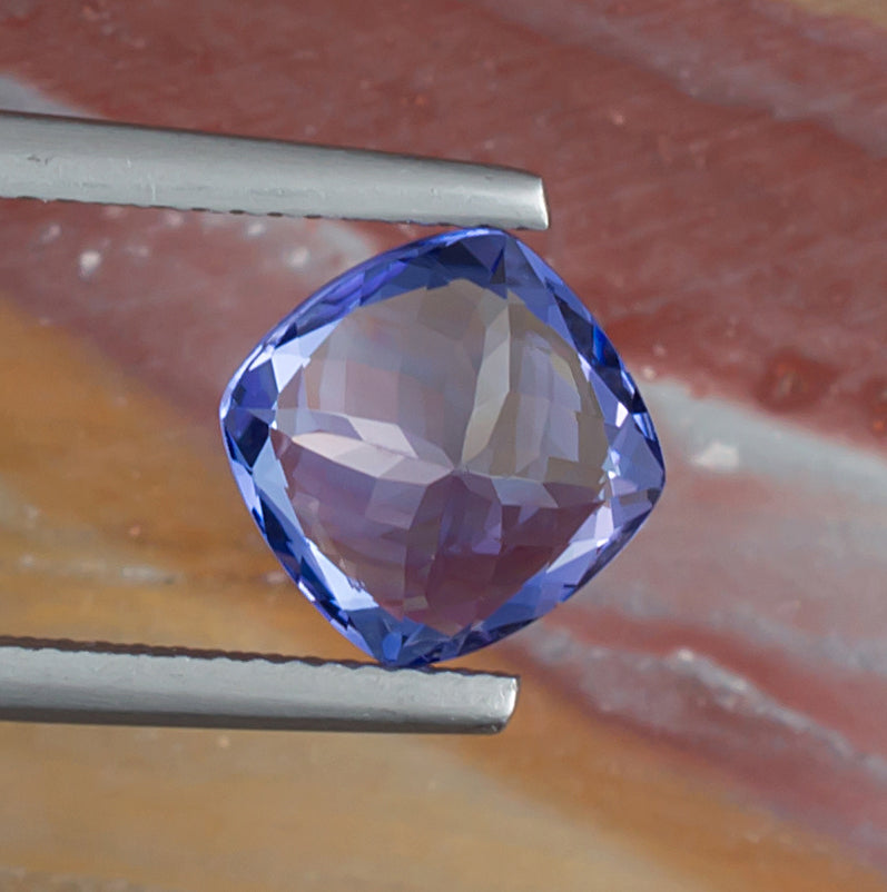 3.08ct Tanzanite Colored Gemstone Bottom View Natural Background