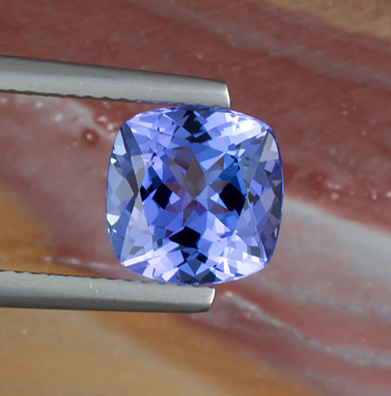 3.08ct Tanzanite Colored Gemstone Top View Natural Background