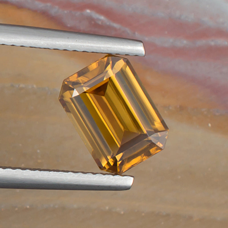 3.73ct Yellow Zircon Colored Gemstone Top View Natural Background