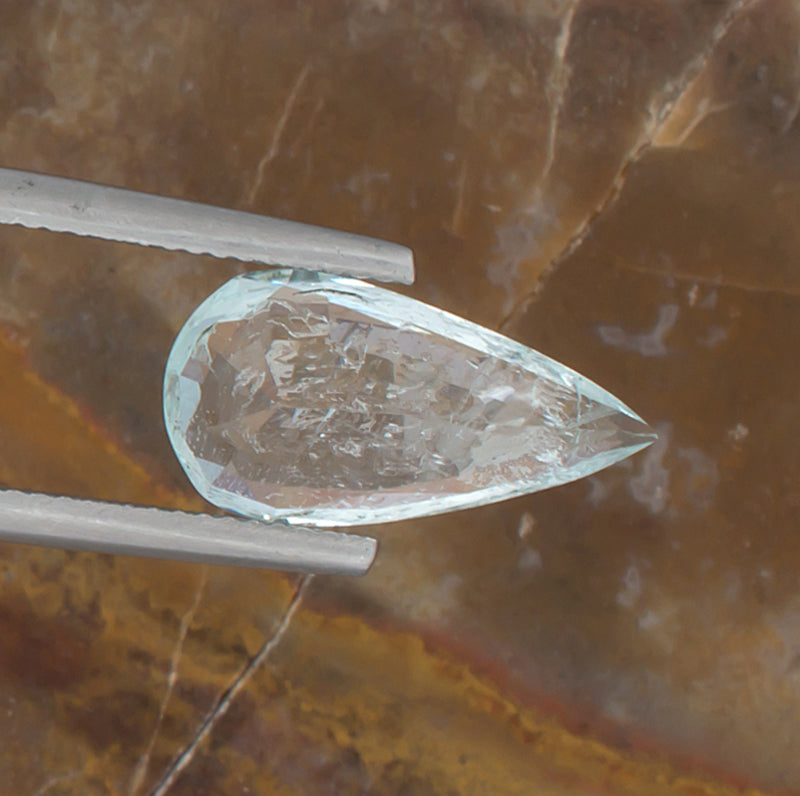 3.84ct Aquamarine Colored Gemstone Bottom View Natural Background