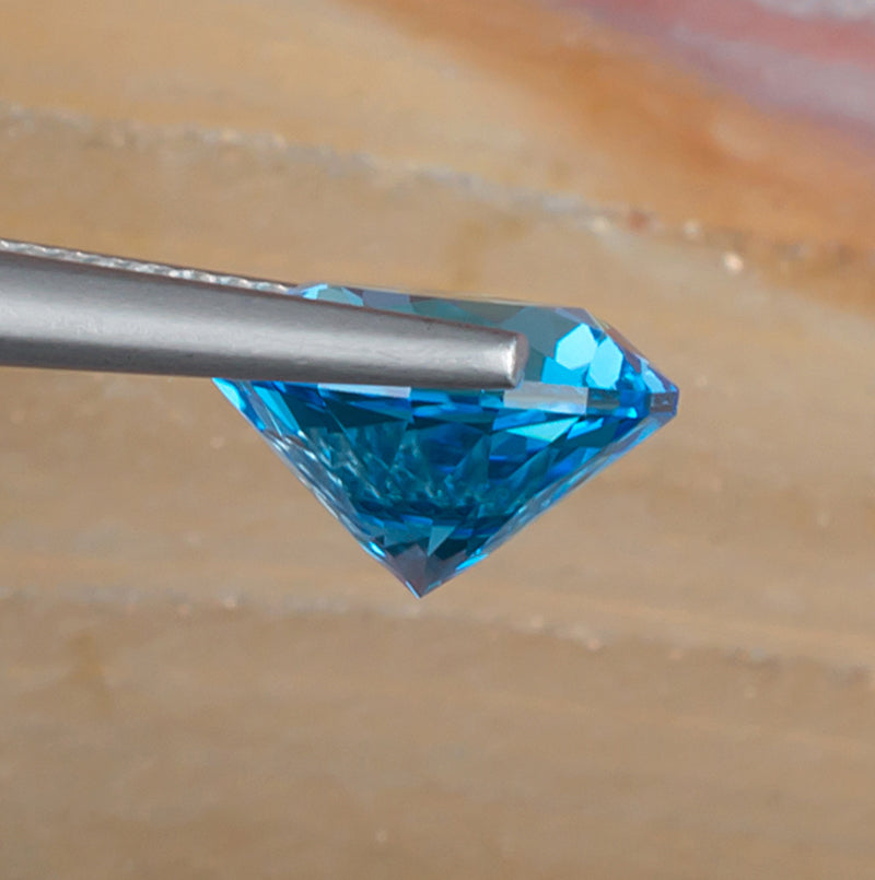 5.13ct Blue Topaz Colored Gemstone Side View Natural Background
