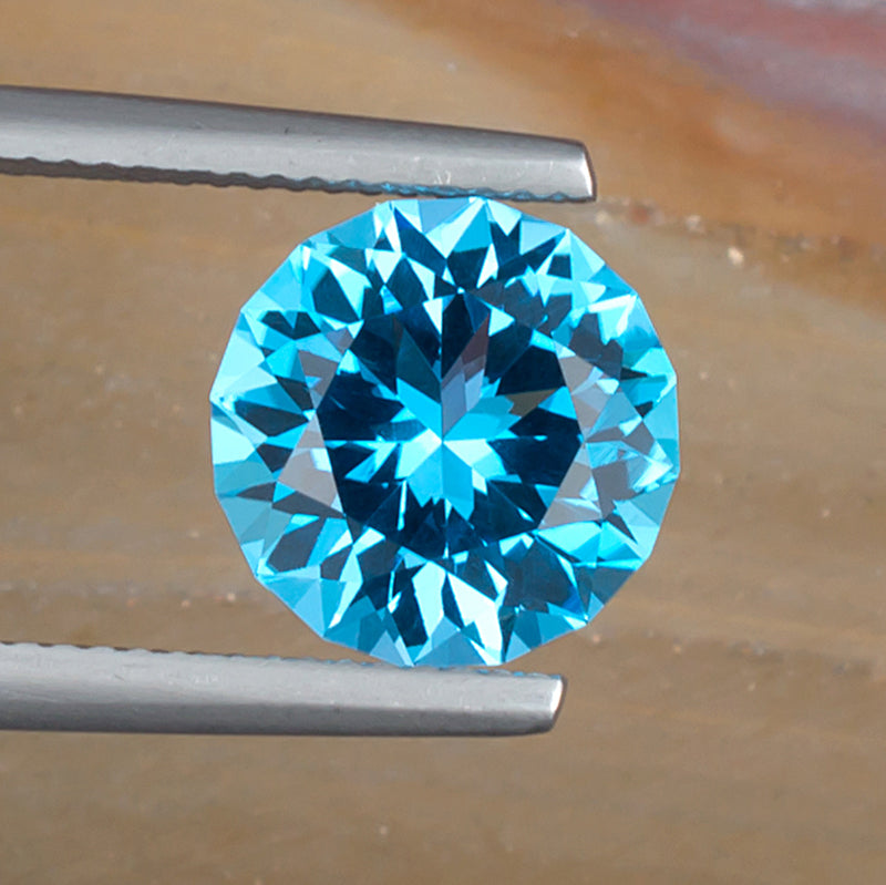 5.13ct Blue Topaz Colored Gemstone Top View Natural Background