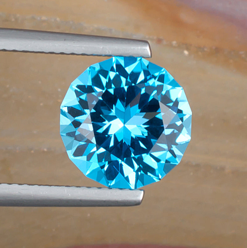 5.13ct Blue Topaz Colored Gemstone Top View Natural Background