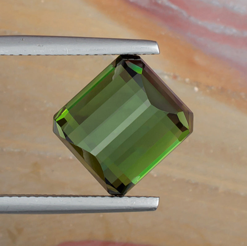 8.93ct Green Tourmaline Colored Gemstone Bottom View Natural Background