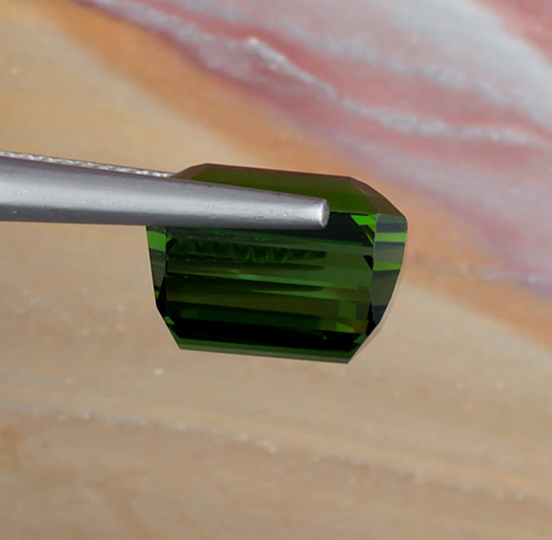 8.93ct Green Tourmaline Colored Gemstone Side View Natural Background
