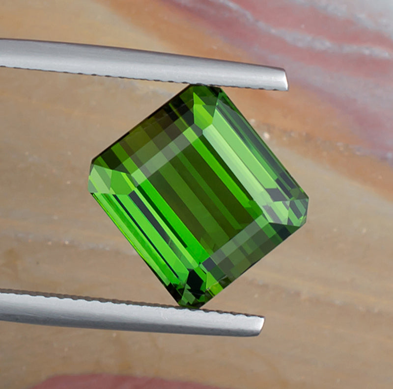 8.93ct Green Tourmaline Colored Gemstone Top View Natural Background