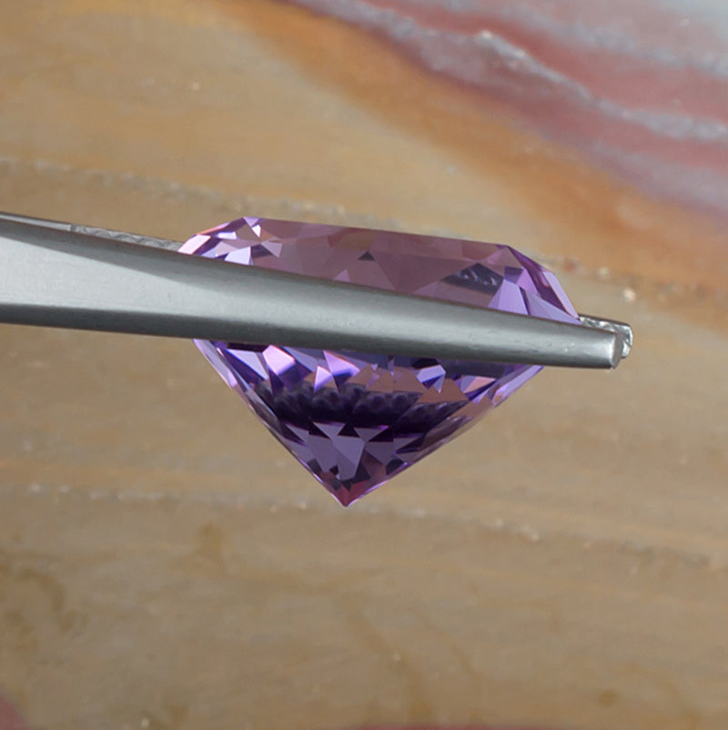 9.73ct Amethyst Colored Gemstone Side View Natural Background