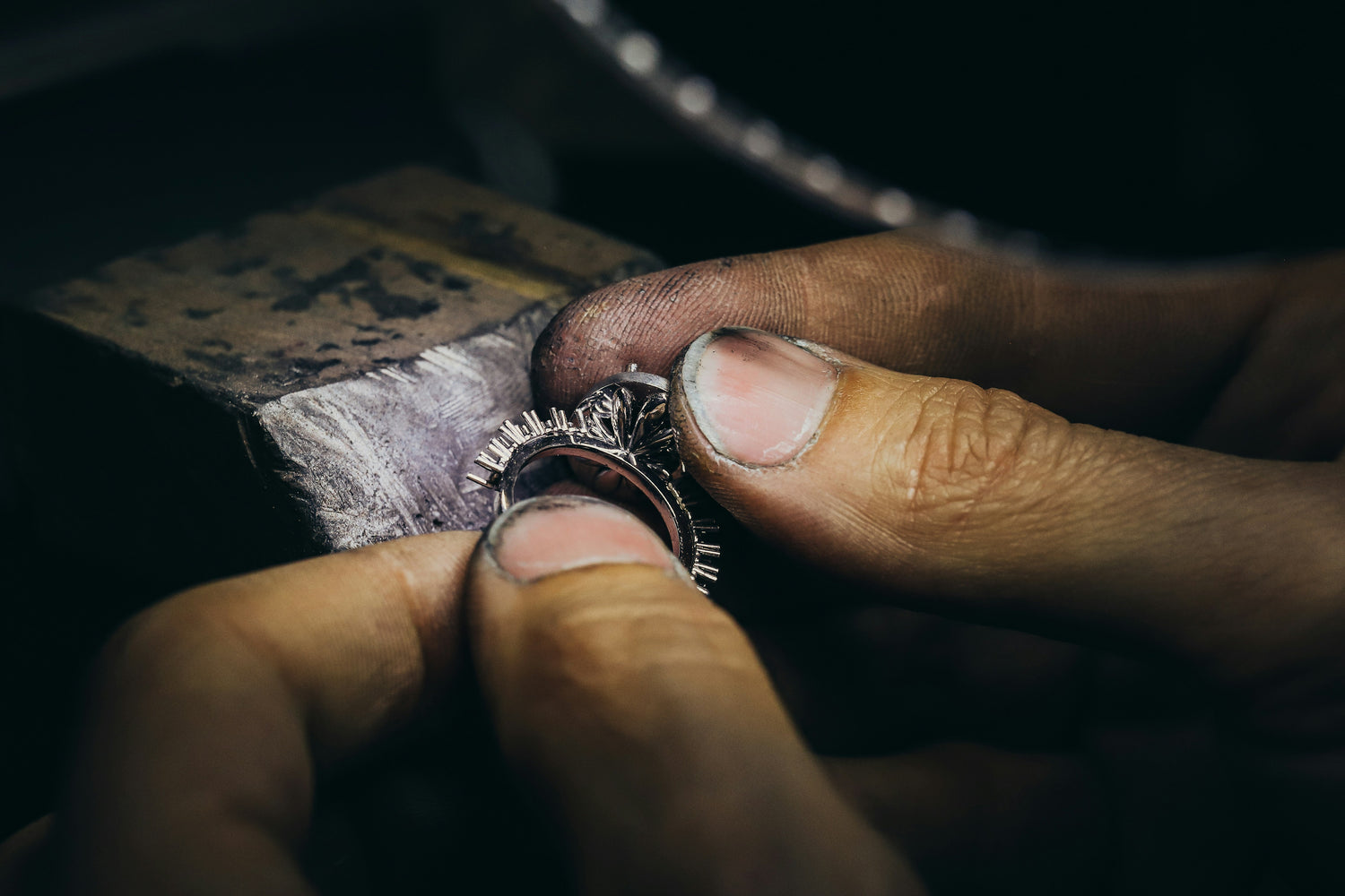 Bench Jeweler Polishing a Handmade RIng