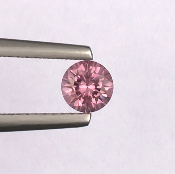 0.59 Malaya Garnet Colored Gemstone Top View White Background
