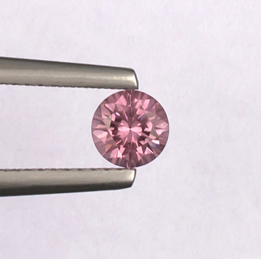 0.59 Malaya Garnet Colored Gemstone Top View White Background
