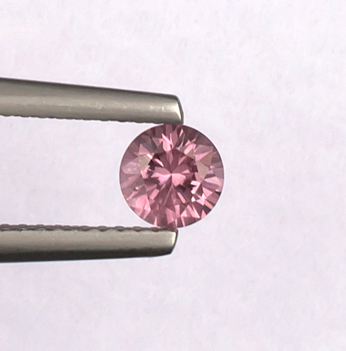 0.59 Malaya Garnet Colored Gemstone Top View White Background
