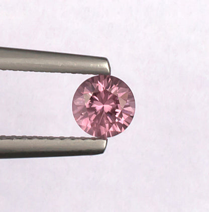 0.59 Malaya Garnet Colored Gemstone Top View White Background
