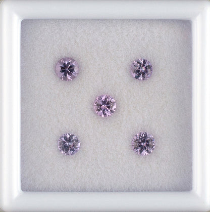 0.64twt Pink Sapphire Colored Gemstone Melee Parcel Top View White Background 
