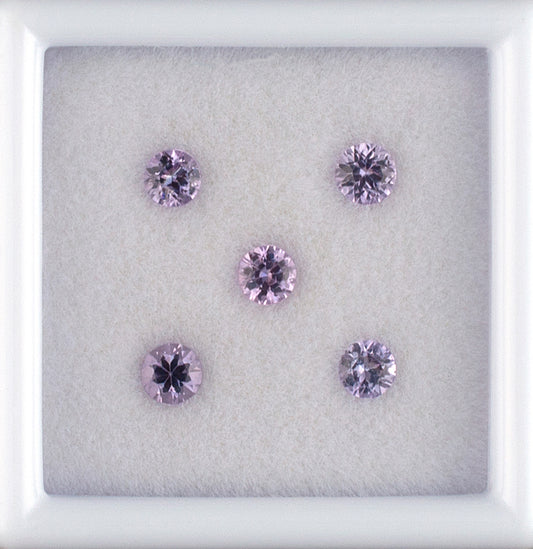 0.64twt Pink Sapphire Colored Gemstone Melee Parcel Top View White Background 
