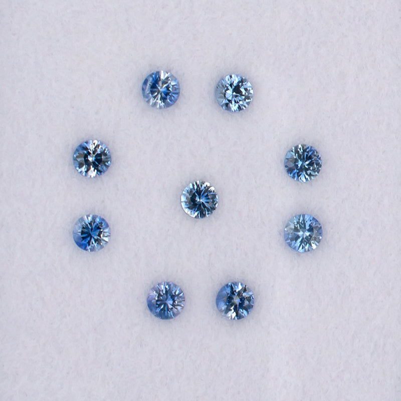 0.82twt Blue Sapphire Colored Gemstone Melee Parcel Top View White Background

