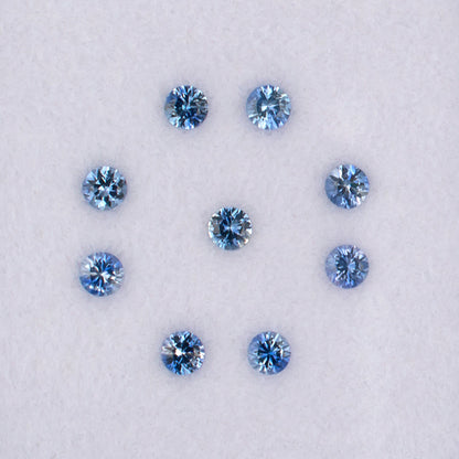 0.82twt Blue Sapphire Colored Gemstone Melee Parcel Top View White Background
