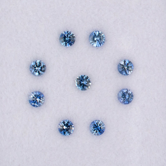 0.82twt Blue Sapphire Colored Gemstone Melee Parcel Top View White Background

